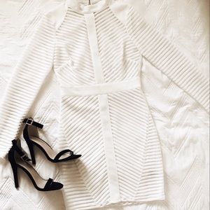 White bodycon dress. Sexy & classy. Size Medium.